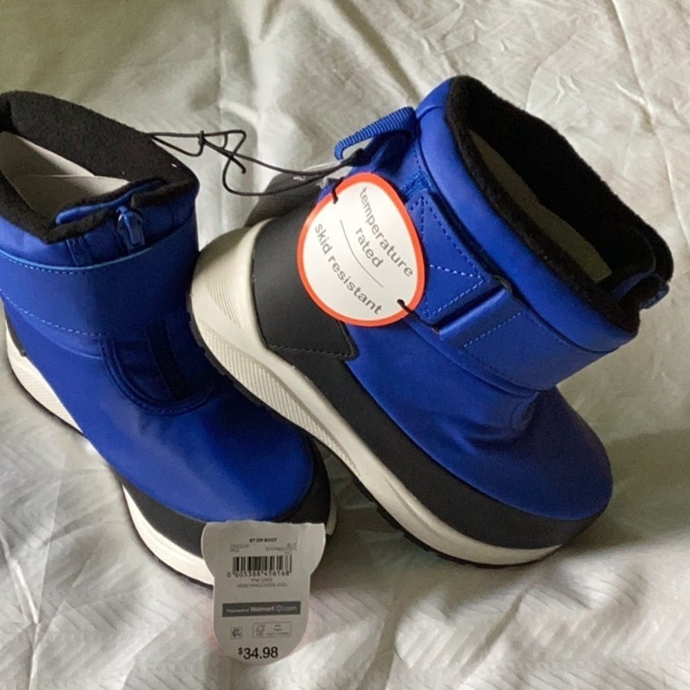 TODDLER boy size 11 zip warm snow boots with Velcro straps. Also have a size 10
